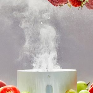 pesticide cleaner in water with tomatoes, grapes and strawberries, bubbles