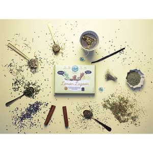 Children's tea Lemon Lagoon surrounded by tea, spoons, tea bags and a mug of tea