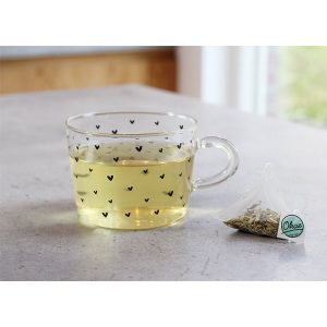 Tea glass with tea, tea bag Okae for kids