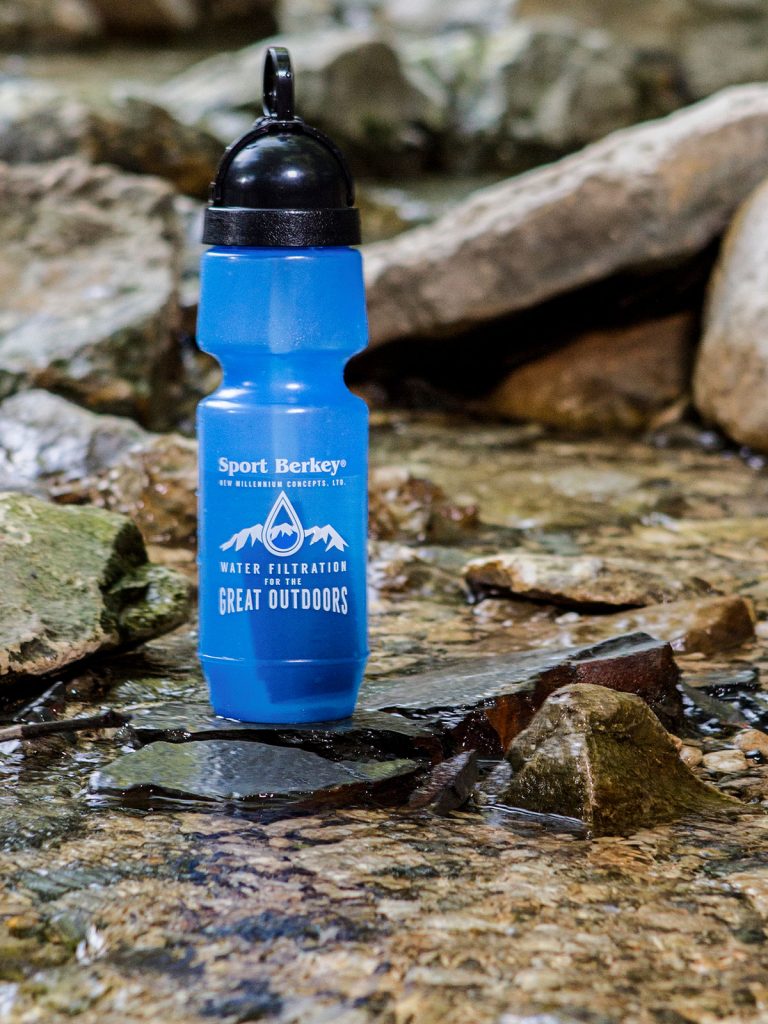 Sport Berkey water bottle in river stream